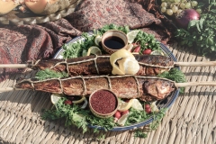 Grilled fish with herbs and sauces